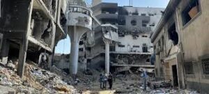 Israeli military bombs hospital in Gaza, several blocks destroyed.